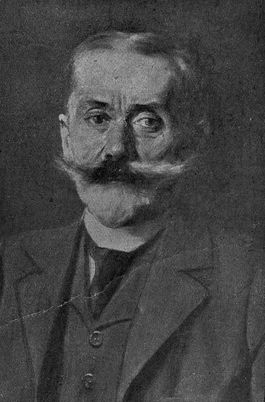 Czarno-biały portret mężczyzny z&nbsp;wąsami